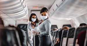 Virus se brzo širi: WHO podržava nošenje maski na dugim letovima